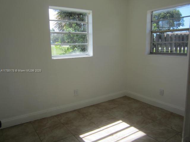 Collier City Pompano Beach, FL 33069 - Photo 14 of 53 a small space with a window