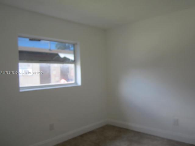 Collier City Pompano Beach, FL 33069 - Photo 18 of 53 a small space with a window