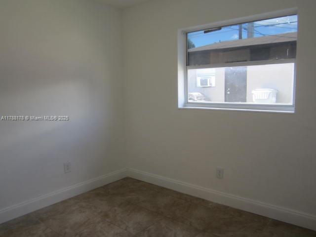 Collier City Pompano Beach, FL 33069 - Photo 20 of 53 a small space with a window