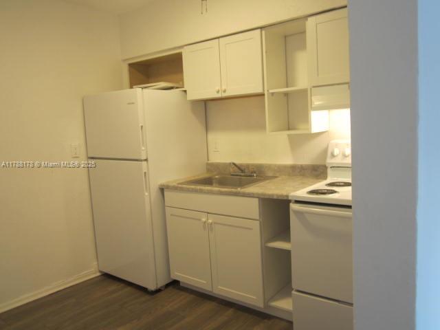 Collier City Pompano Beach, FL 33069 - Photo 24 of 53 a bathroom with a shower and a sink