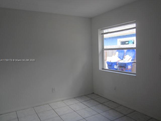 Collier City Pompano Beach, FL 33069 - Photo 26 of 53 an empty room with window