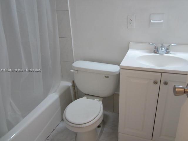 Collier City Pompano Beach, FL 33069 - Photo 28 of 53 a bathroom with a sink and a toilet