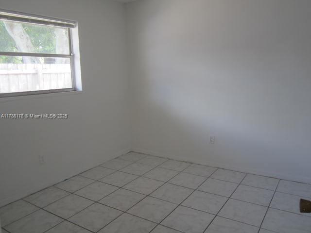 Collier City Pompano Beach, FL 33069 - Photo 33 of 53 an empty room with a window