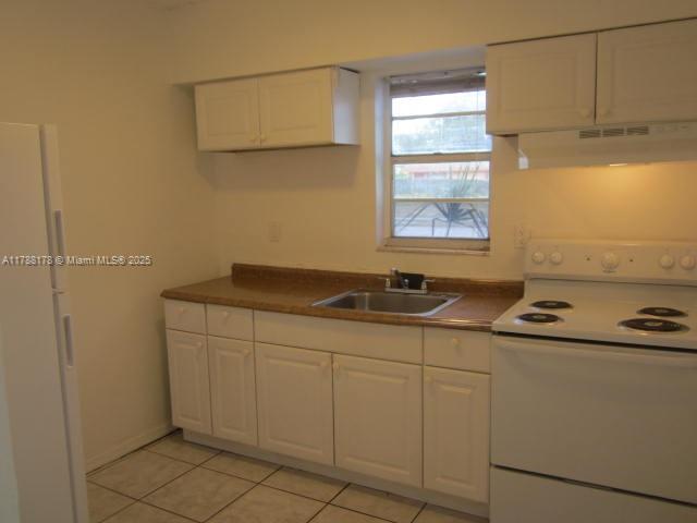 Collier City Pompano Beach, FL 33069 - Photo 49 of 53 a room with storage and utility