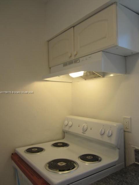 Collier City Pompano Beach, FL 33069 - Photo 5 of 53 a bathroom with a sink and a toilet