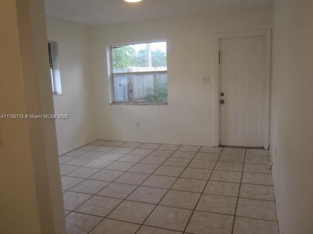 Collier City Pompano Beach, FL 33069 - Photo 51 of 53 a view of an empty room and window