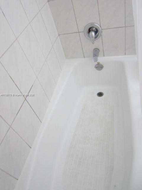 Collier City Pompano Beach, FL 33069 - Photo 53 of 53 a bathroom with a white shower