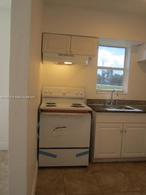 Collier City Pompano Beach, FL 33069 - Photo 7 of 53 a bathroom with a sink and a mirror