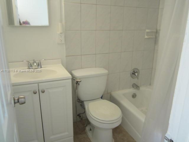 Collier City Pompano Beach, FL 33069 - Photo 9 of 53 a bathroom with a sink toilet and shower