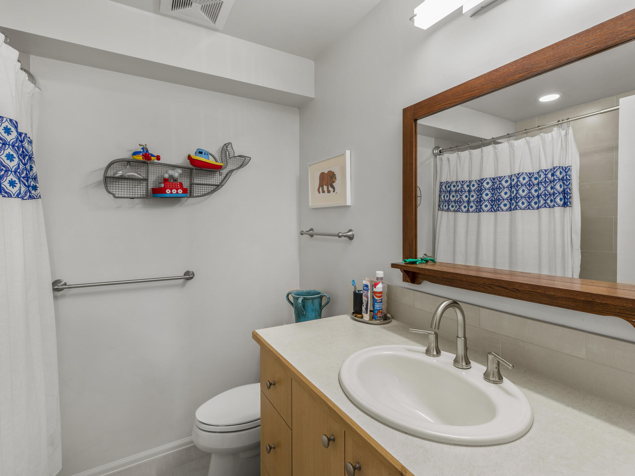 165 Alexander Overlook Telluride, CO 81435 - Photo 13 of 27 a bathroom with a sink mirror and toilet