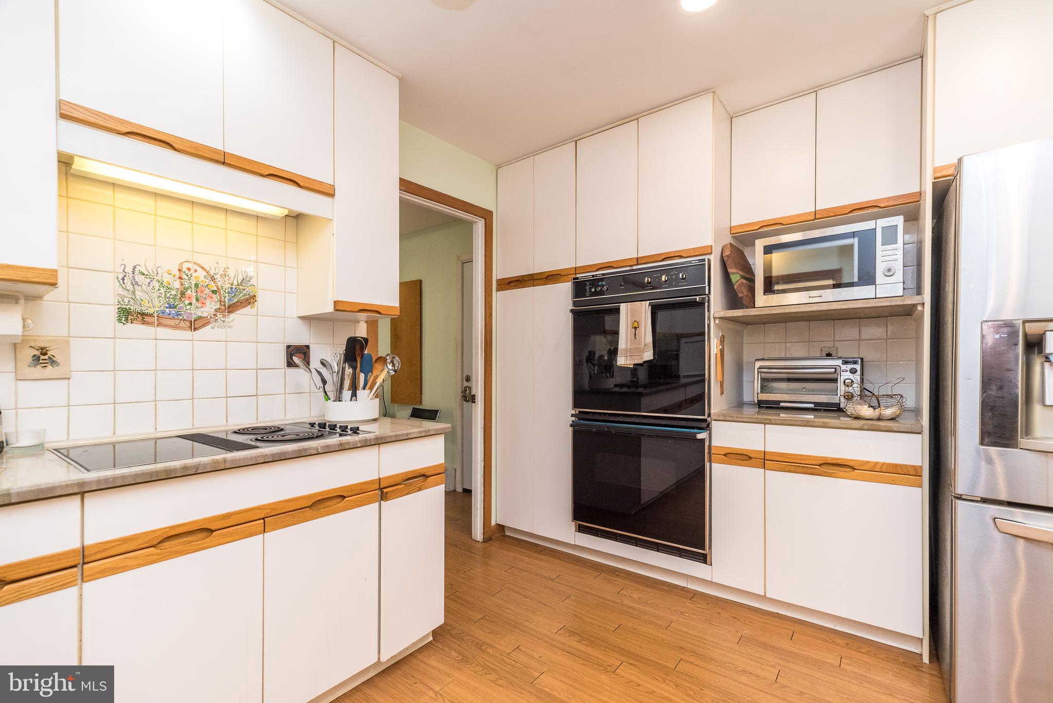 2728 Red Gate Drive Doylestown, PA 18902 - Photo 12 of 42 a kitchen with stainless steel appliances granite countertop a refrigerator and a stove top oven