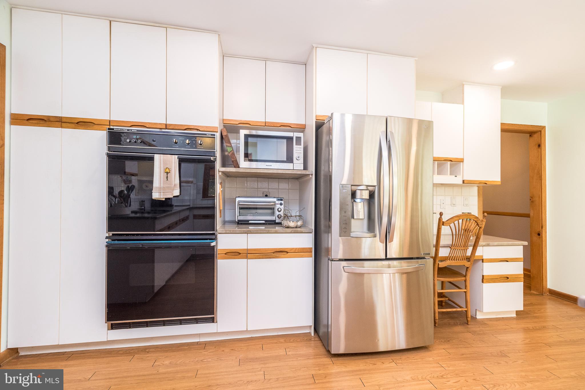 2728 Red Gate Drive Doylestown, PA 18902 - Photo 16 of 42 a kitchen with stainless steel appliances a refrigerator stove and microwave