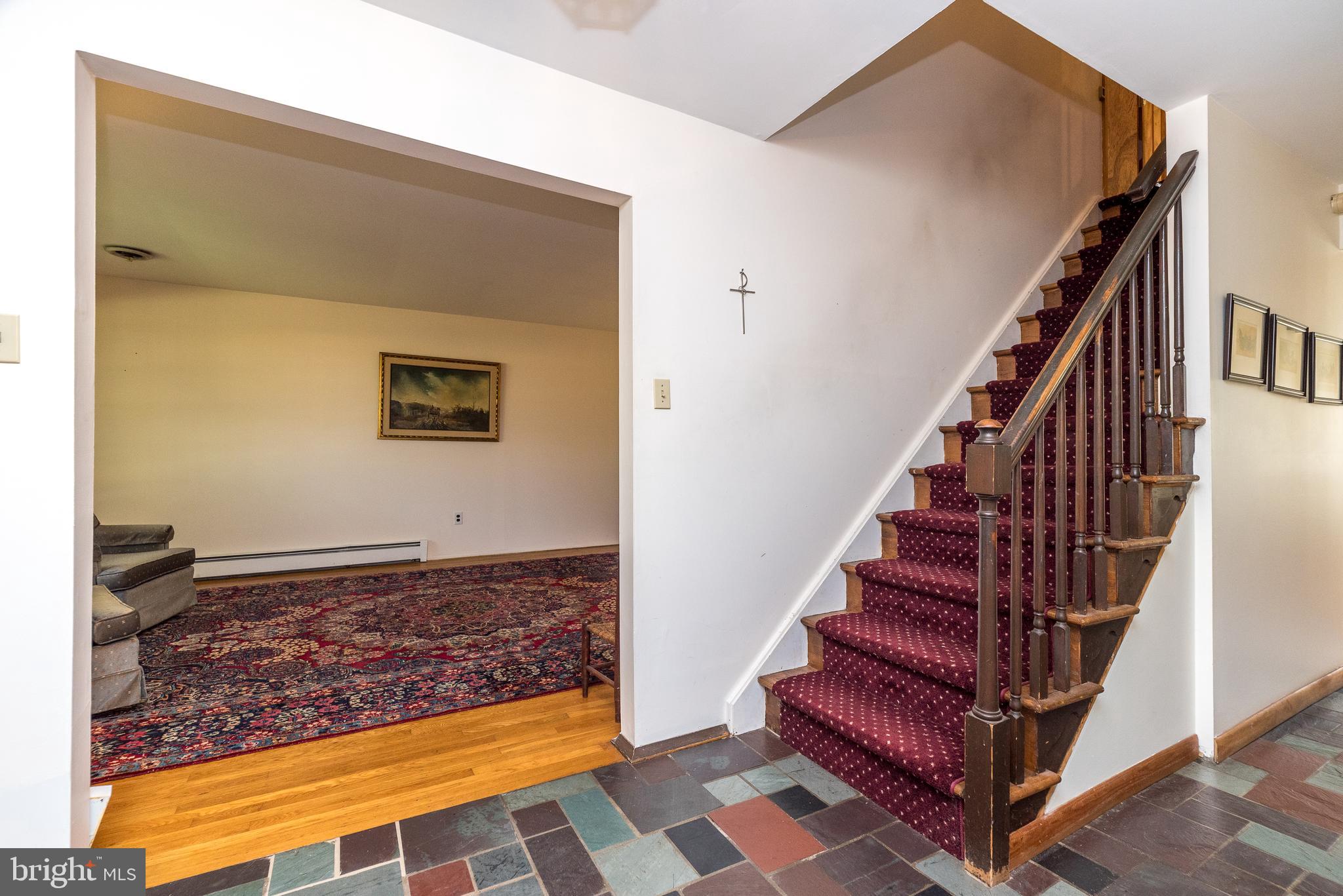 2728 Red Gate Drive Doylestown, PA 18902 - Photo 22 of 42 a view of a living room with a rug and stairs