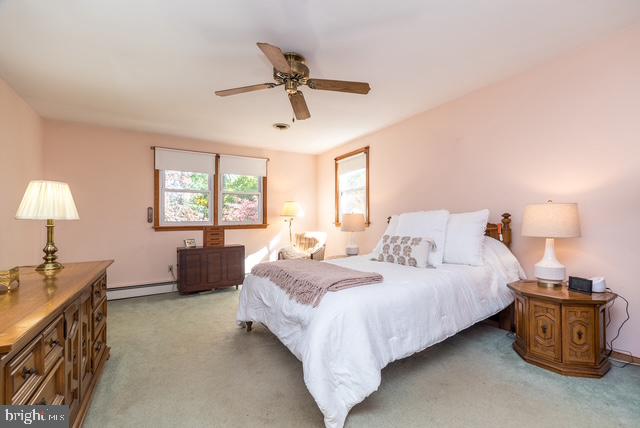 2728 Red Gate Drive Doylestown, PA 18902 - Photo 23 of 42 a bedroom with a bed and a chandelier