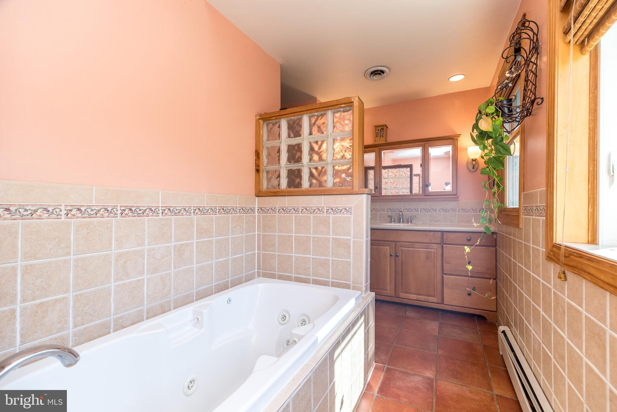 2728 Red Gate Drive Doylestown, PA 18902 - Photo 27 of 42 a bathroom with a bathtub and a sink