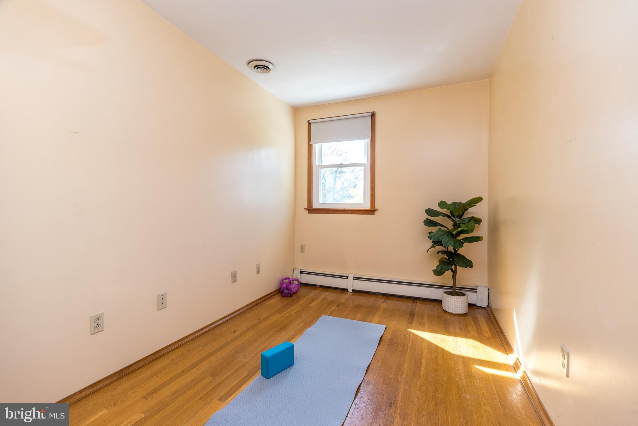 2728 Red Gate Drive Doylestown, PA 18902 - Photo 34 of 42 a view of a room with wooden floor and potted plant