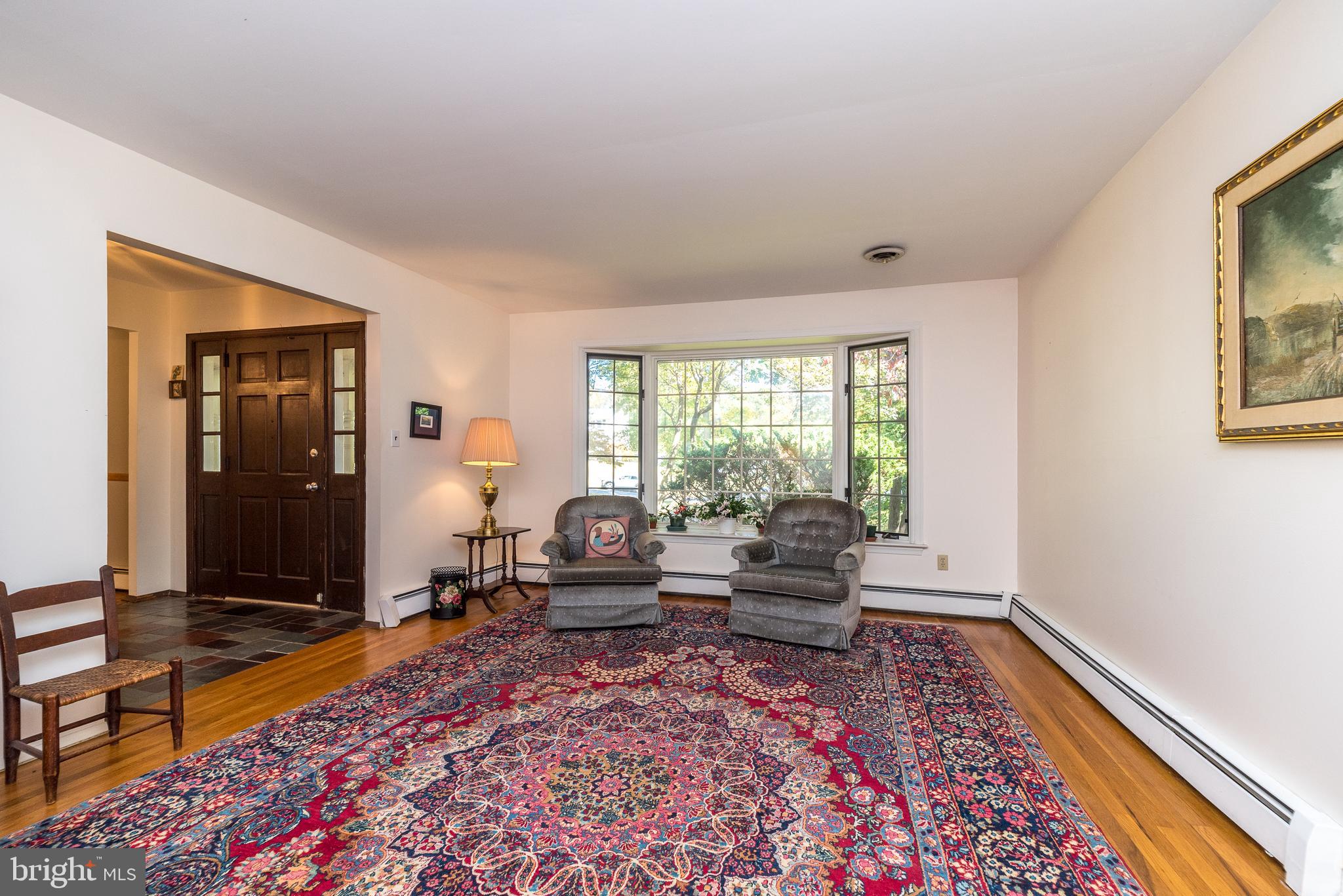 2728 Red Gate Drive Doylestown, PA 18902 - Photo 6 of 42 a living room with furniture rug and a table