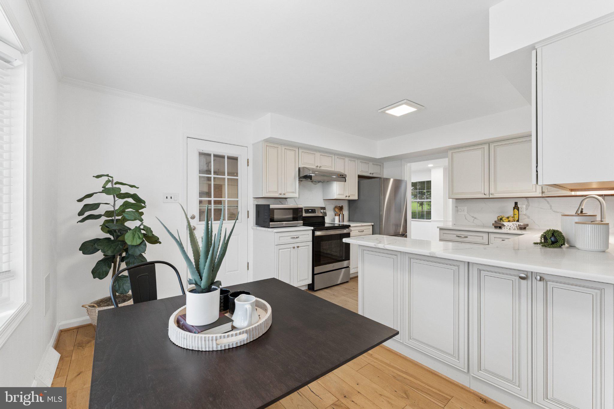 3219 Fox Mill Road Oakton, VA 22124 - Photo 22 of 87 Bright and airy modern kitchen space.