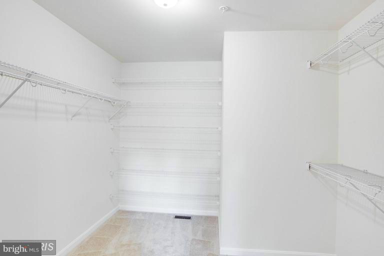 4590 Hallowing Point Road Prince Frederick, MD 20678 - Photo 18 of 25 Master Bedroom Walk-in Closet