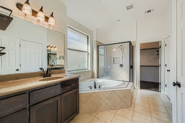 an empty room with a empty space and windows