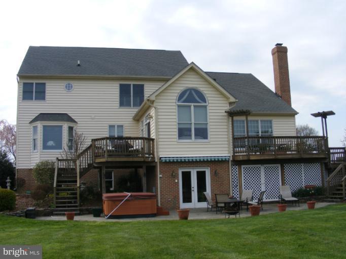 2941 Lonesome Dove Road Mount Airy, MD 21771 - Photo 23 of 30 Rear of home with patio and 2 decks