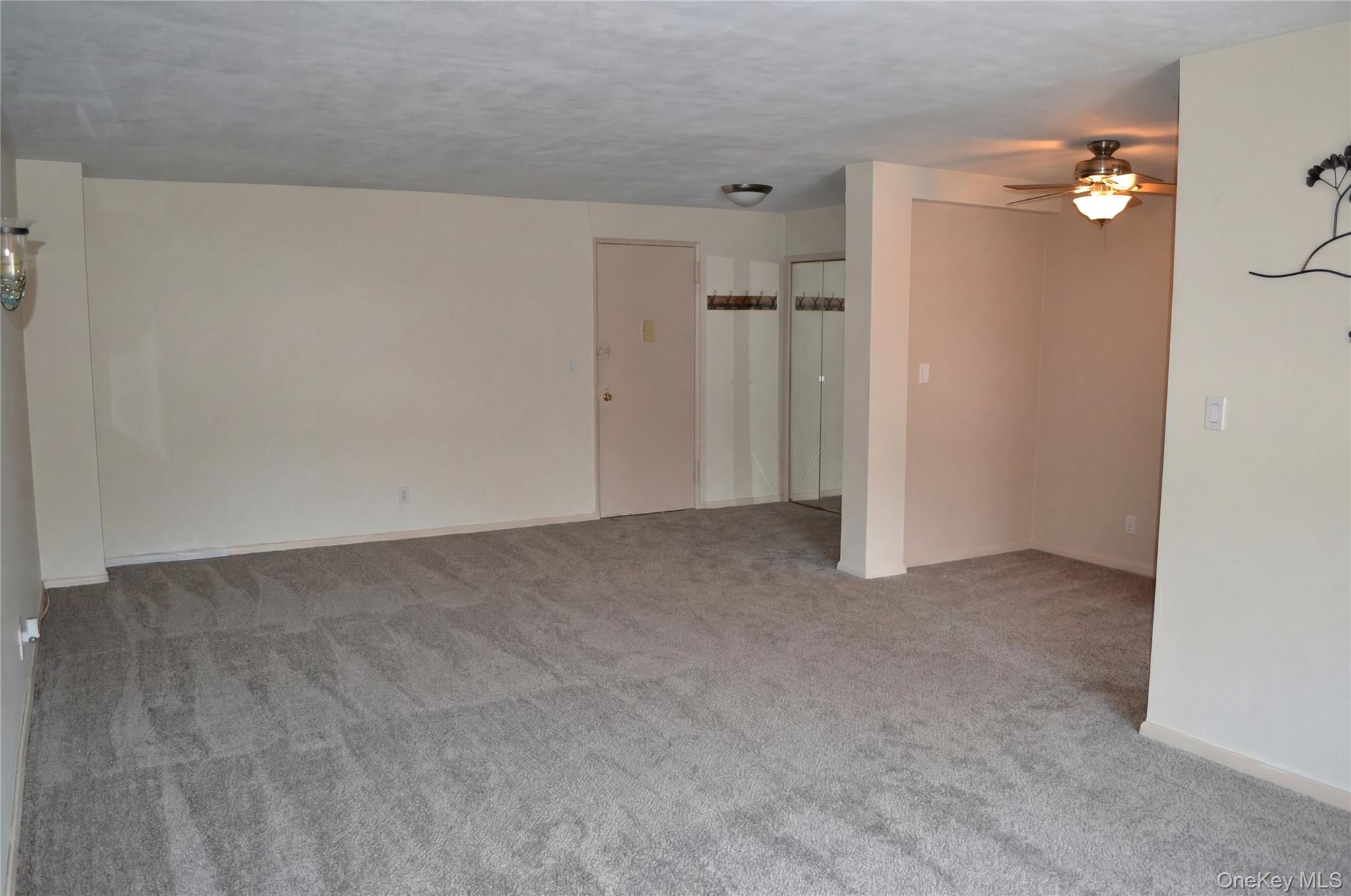 245 Rumsey Road, Unit 6X Yonkers, NY 10701 - Photo 2 of 27 Virtual Picture with "new" carpeting.