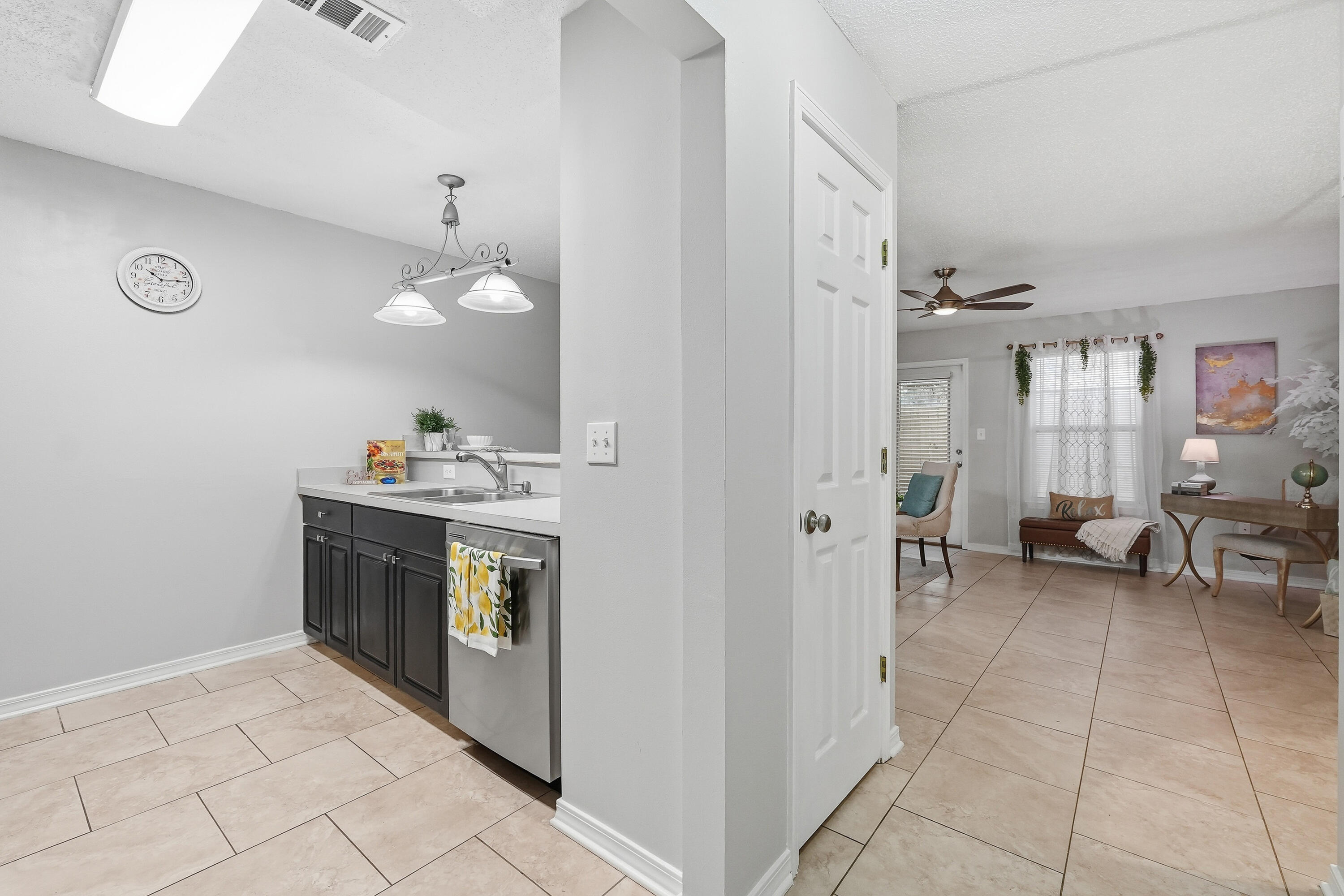 481 Keystone Road Mary Esther, FL 32569 - Photo 14 of 35 a kitchen with stainless steel appliances granite countertop a sink and a refrigerator