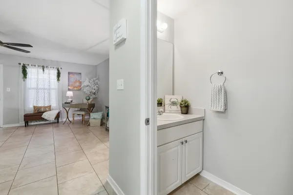 a view of bathroom with dual sinks