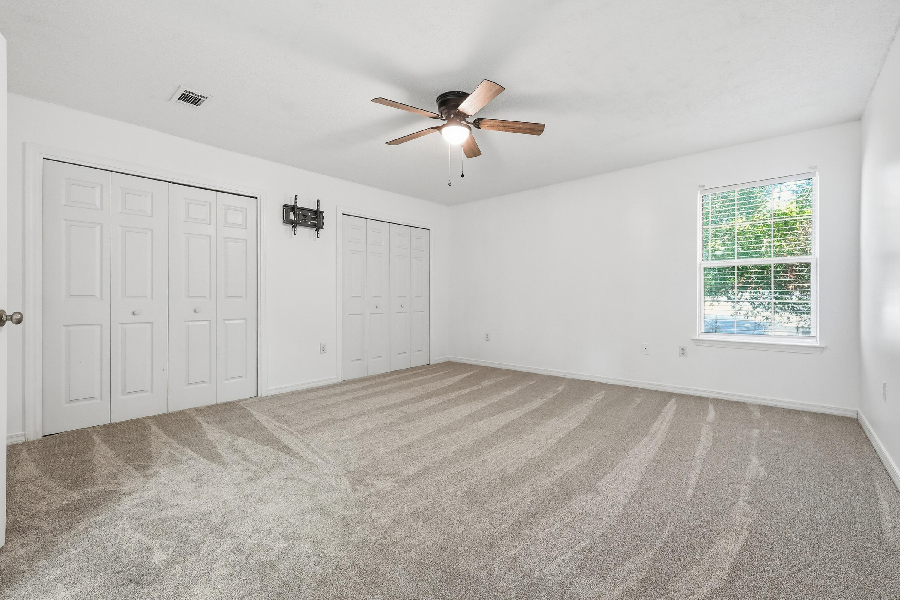 481 Keystone Road Mary Esther, FL 32569 - Photo 20 of 35 a view of an empty room with a window