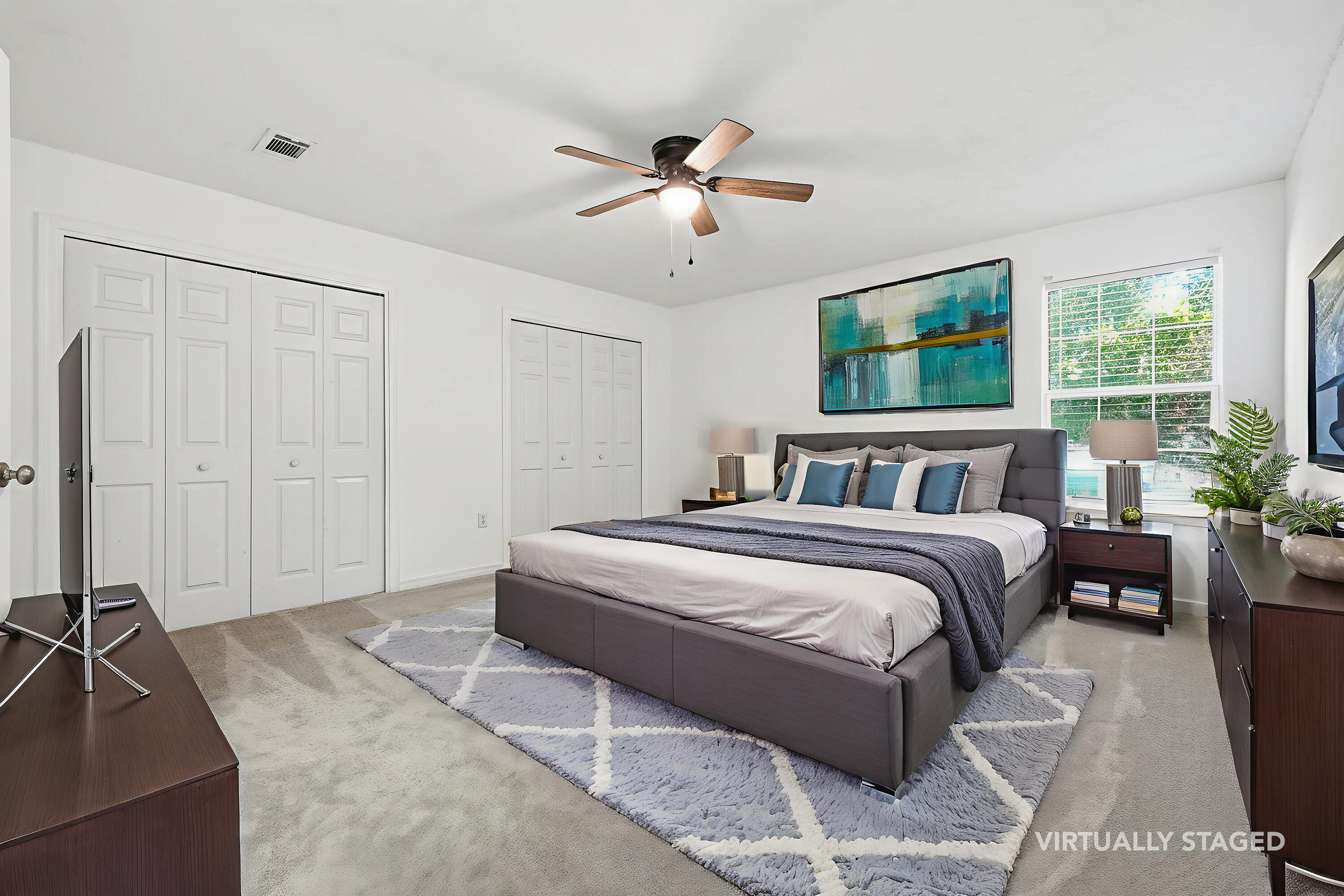481 Keystone Road Mary Esther, FL 32569 - Photo 21 of 35 a bedroom with a large bed and a chandelier