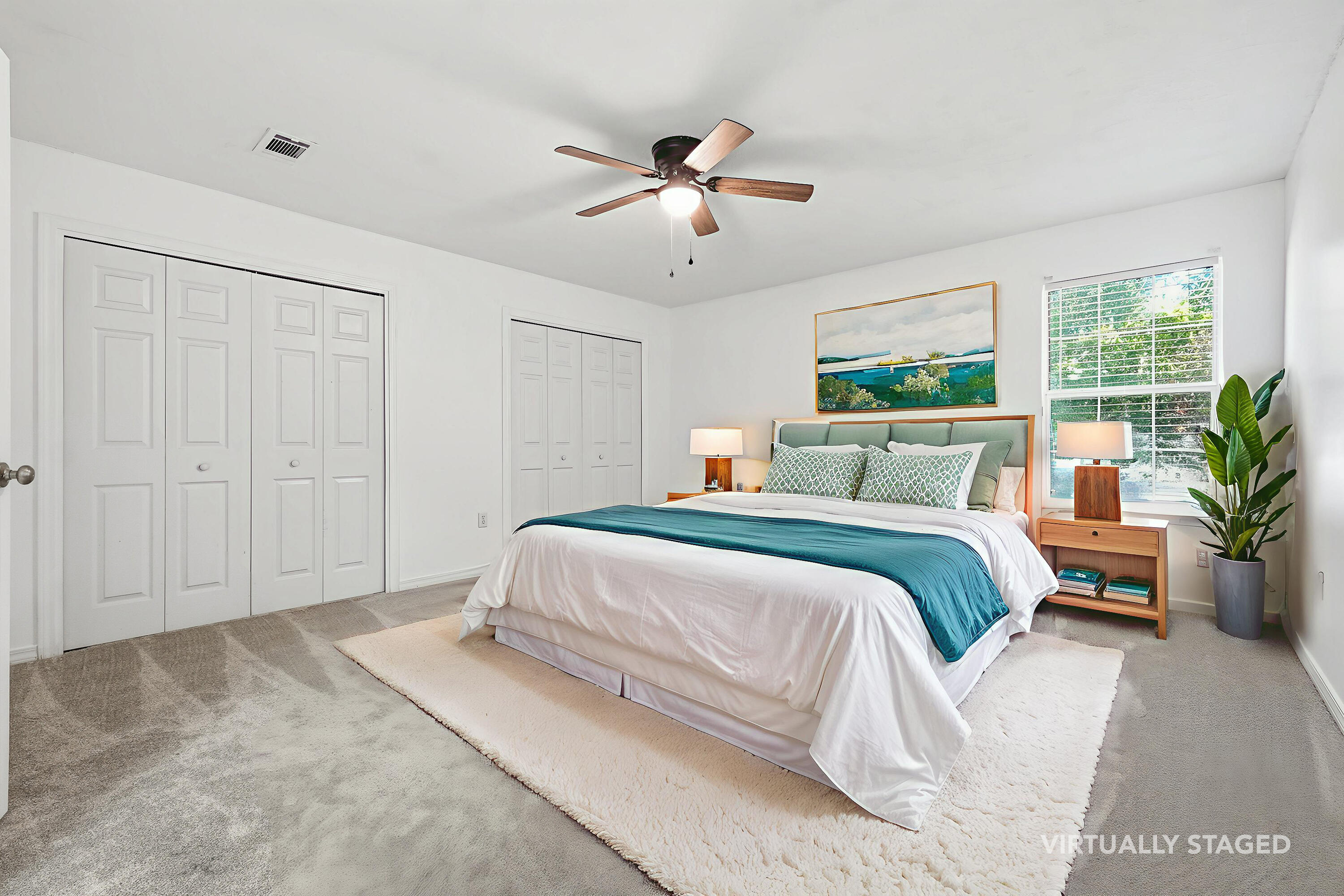 481 Keystone Road Mary Esther, FL 32569 - Photo 23 of 35 a bedroom with a large bed and a chandelier