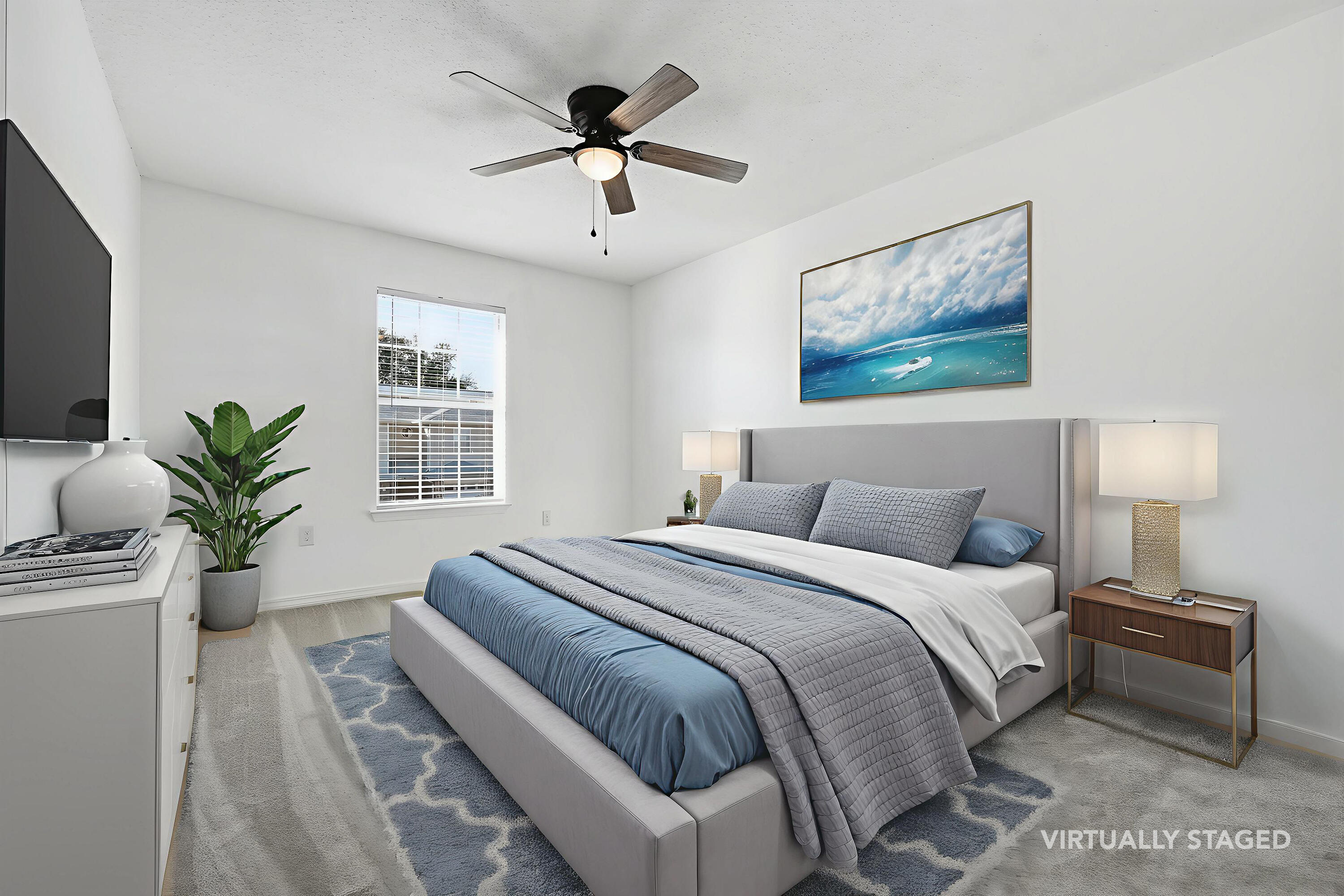 481 Keystone Road Mary Esther, FL 32569 - Photo 26 of 35 a bedroom with a large bed and a chandelier