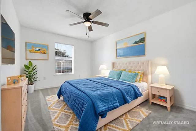 a view of a livingroom with a ceiling fan