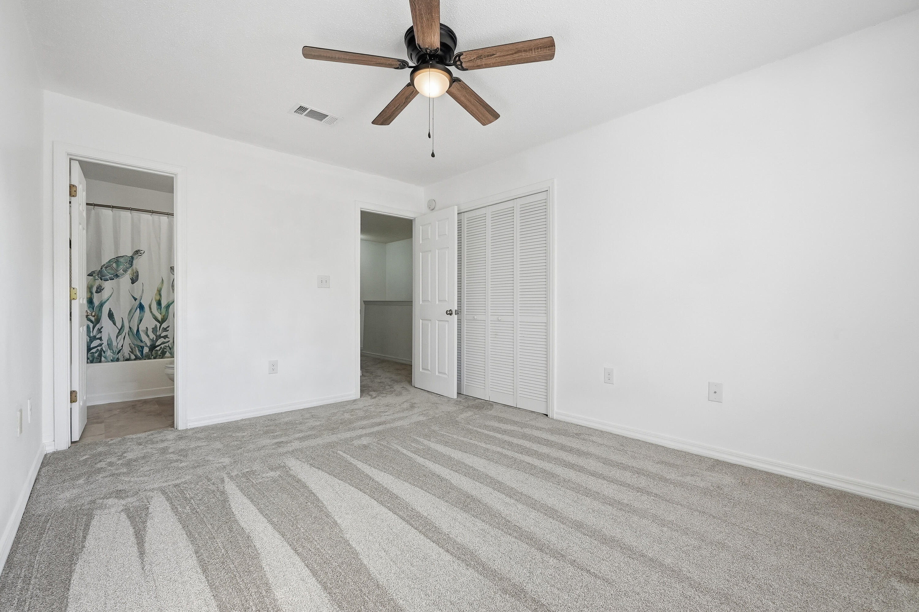 481 Keystone Road Mary Esther, FL 32569 - Photo 28 of 35 a view of a livingroom with a ceiling fan
