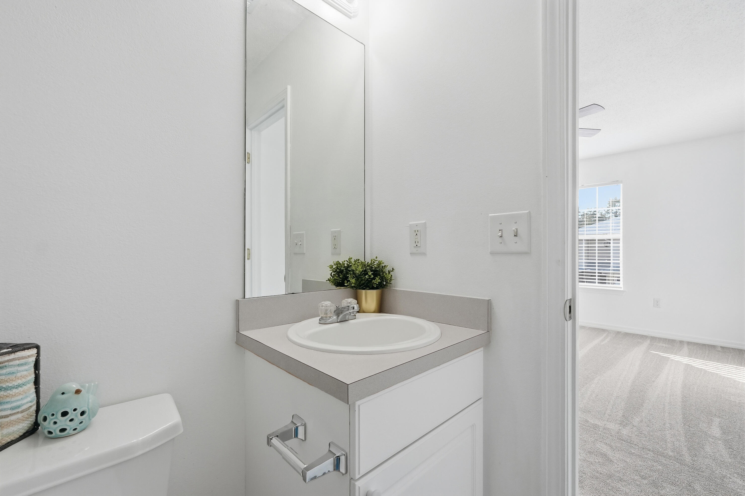 481 Keystone Road Mary Esther, FL 32569 - Photo 30 of 35 a bathroom with a sink and a toilet