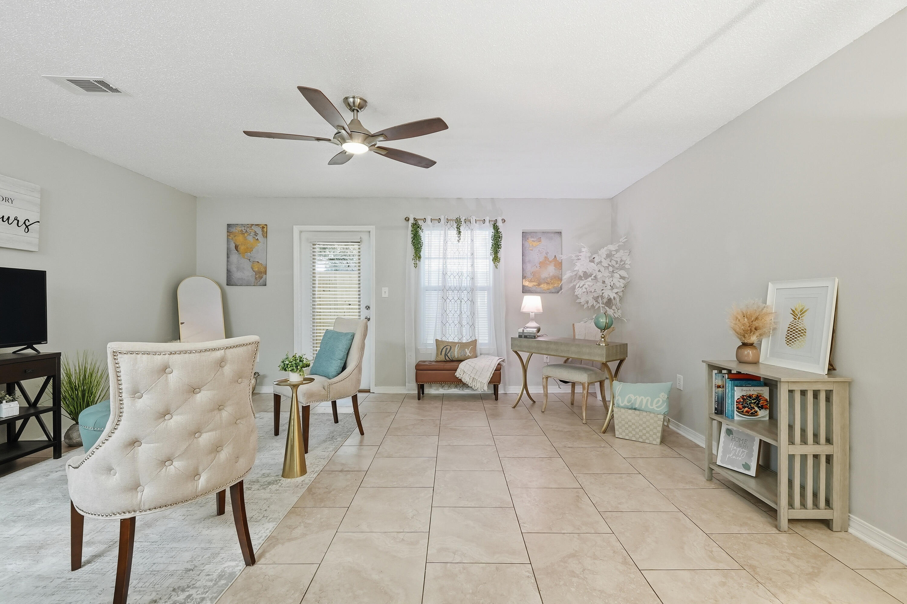 481 Keystone Road Mary Esther, FL 32569 - Photo 5 of 35 a living room with furniture and a window