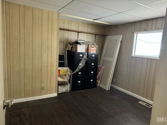 a view of a livingroom with wooden floor