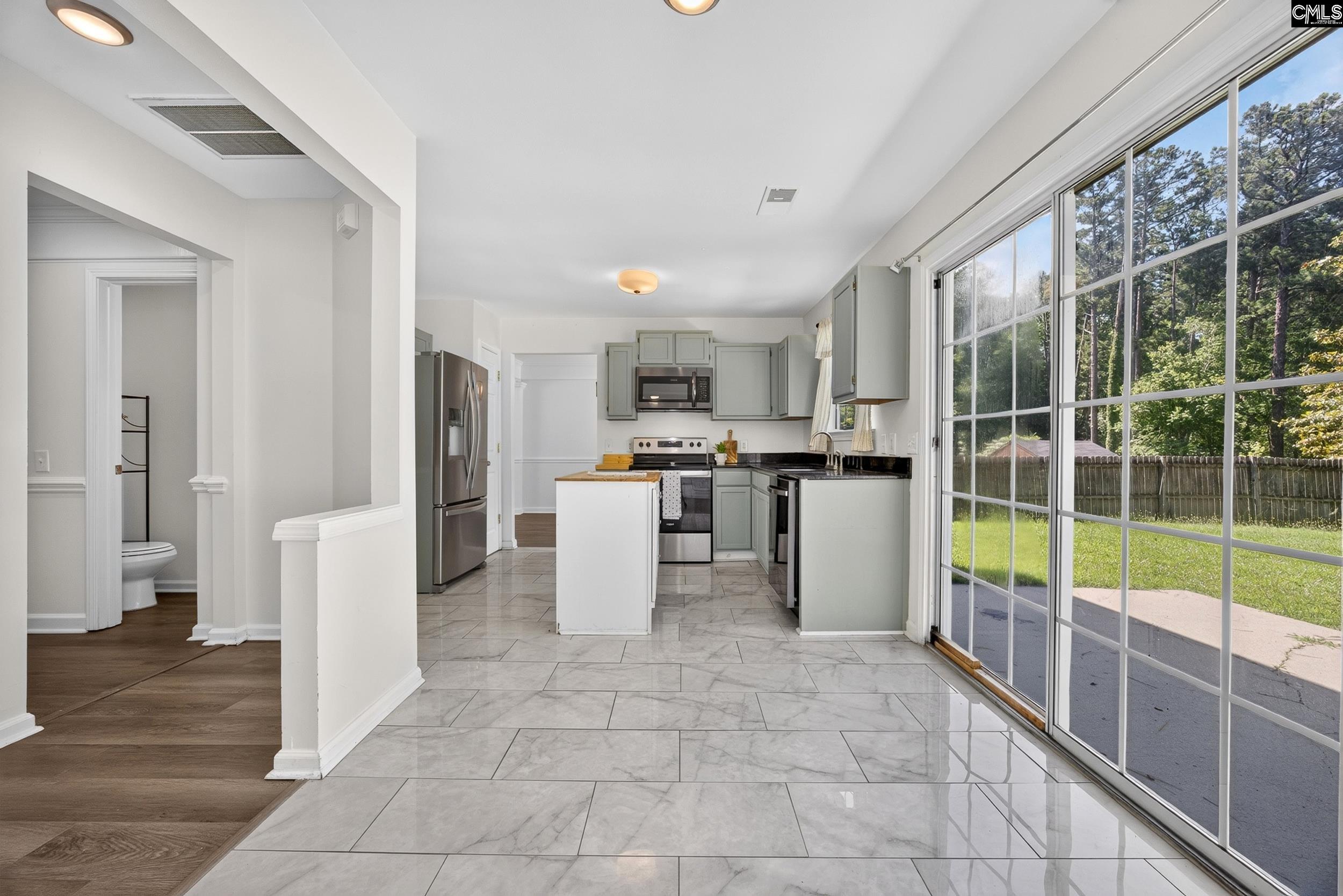 407 Sesqui Trail Columbia, SC 29223 - Photo 17 of 34 a kitchen with stainless steel appliances a refrigerator and a sink