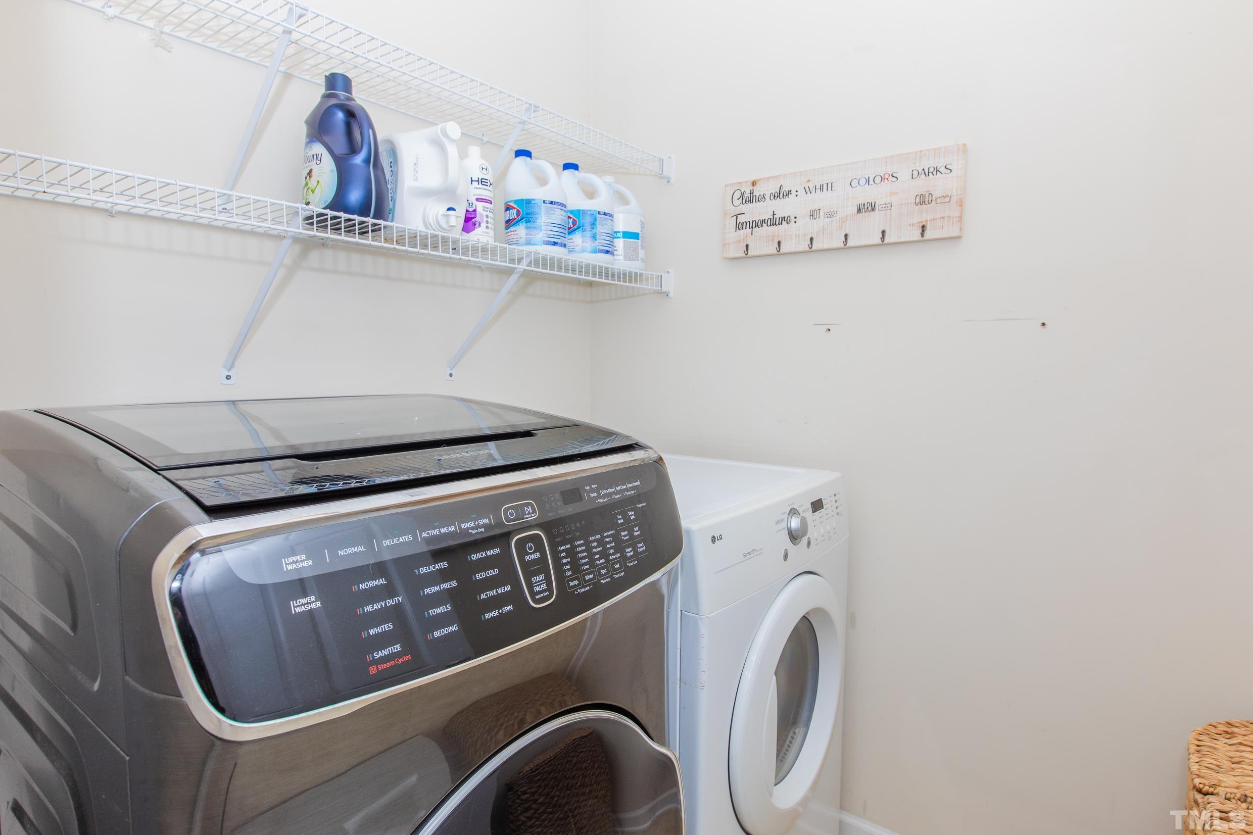 4228 Amber Stone Way Durham, NC 27704 - Photo 14 of 34 a utility room with dryer and washer