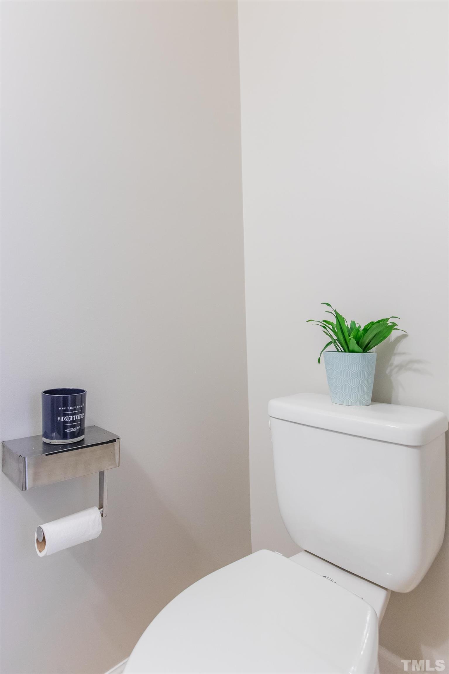 4228 Amber Stone Way Durham, NC 27704 - Photo 16 of 34 a white toilet sitting next to a white toilet