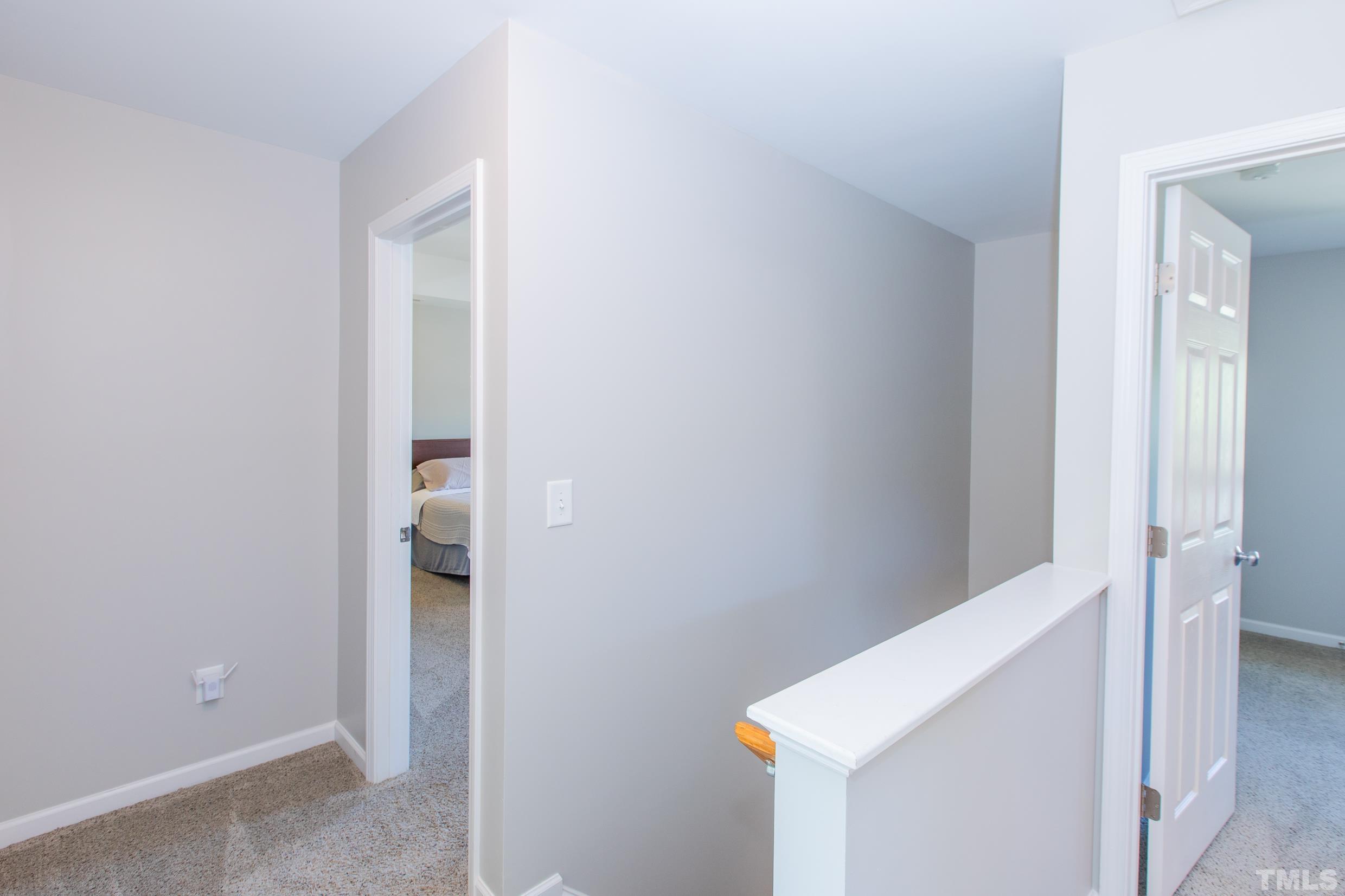 4228 Amber Stone Way Durham, NC 27704 - Photo 19 of 34 a view of way to rooms