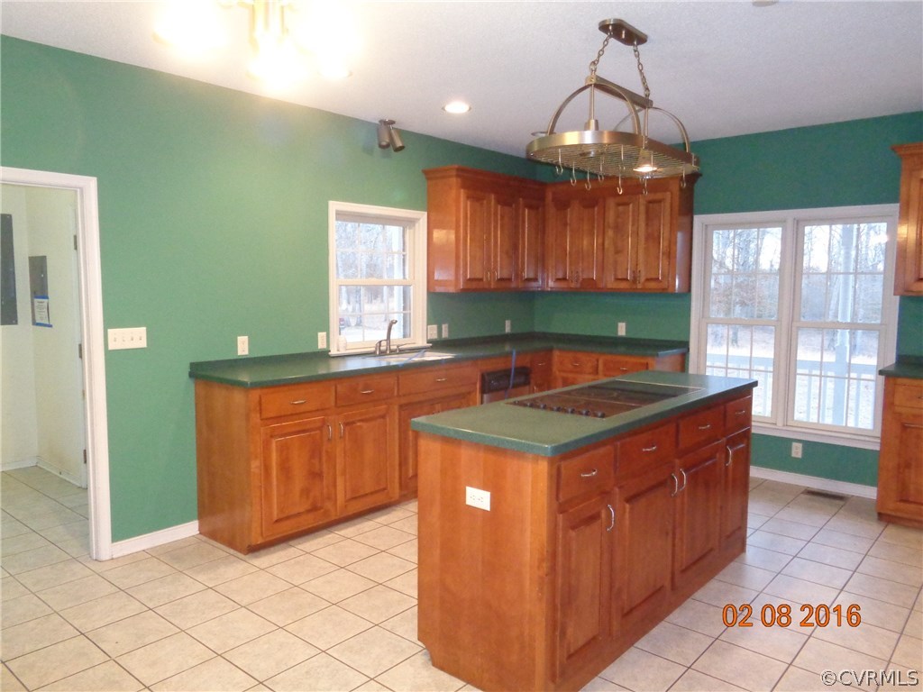 20172 Horseshoe Road Carson, VA 23830 - Photo 6 of 27 a kitchen with granite countertop a sink and a stove