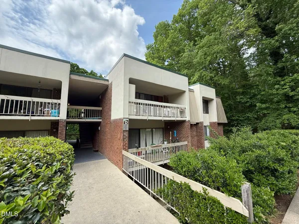 a view of balcony with furniture