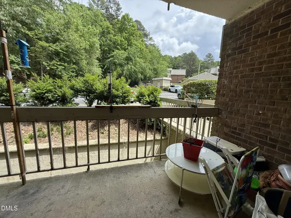 a view of a chair in a balcony