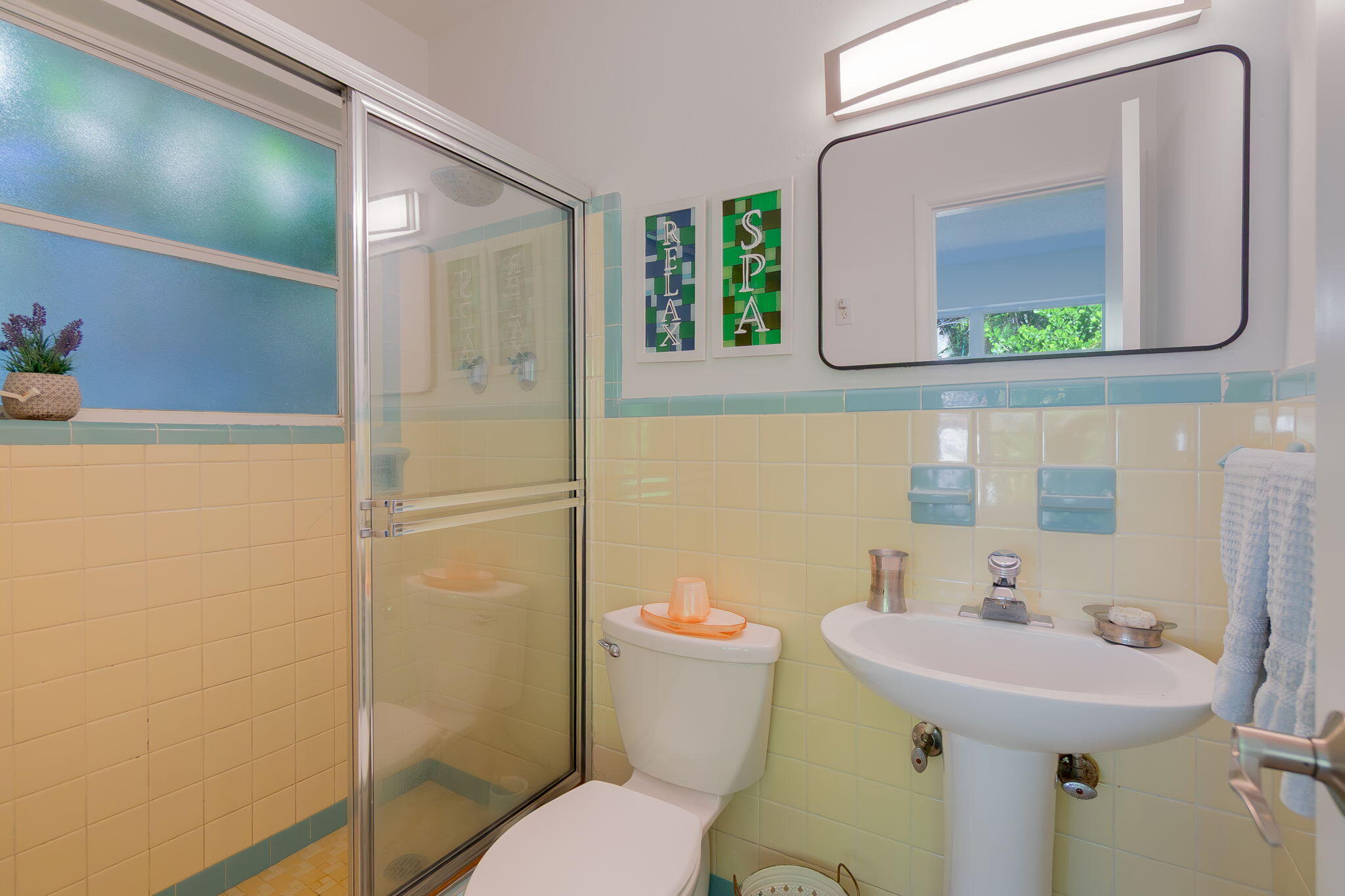 651 Ocean Inlet Drive Boynton Beach, FL 33435 - Photo 21 of 44 a bathroom with a sink mirror toilet and vanity