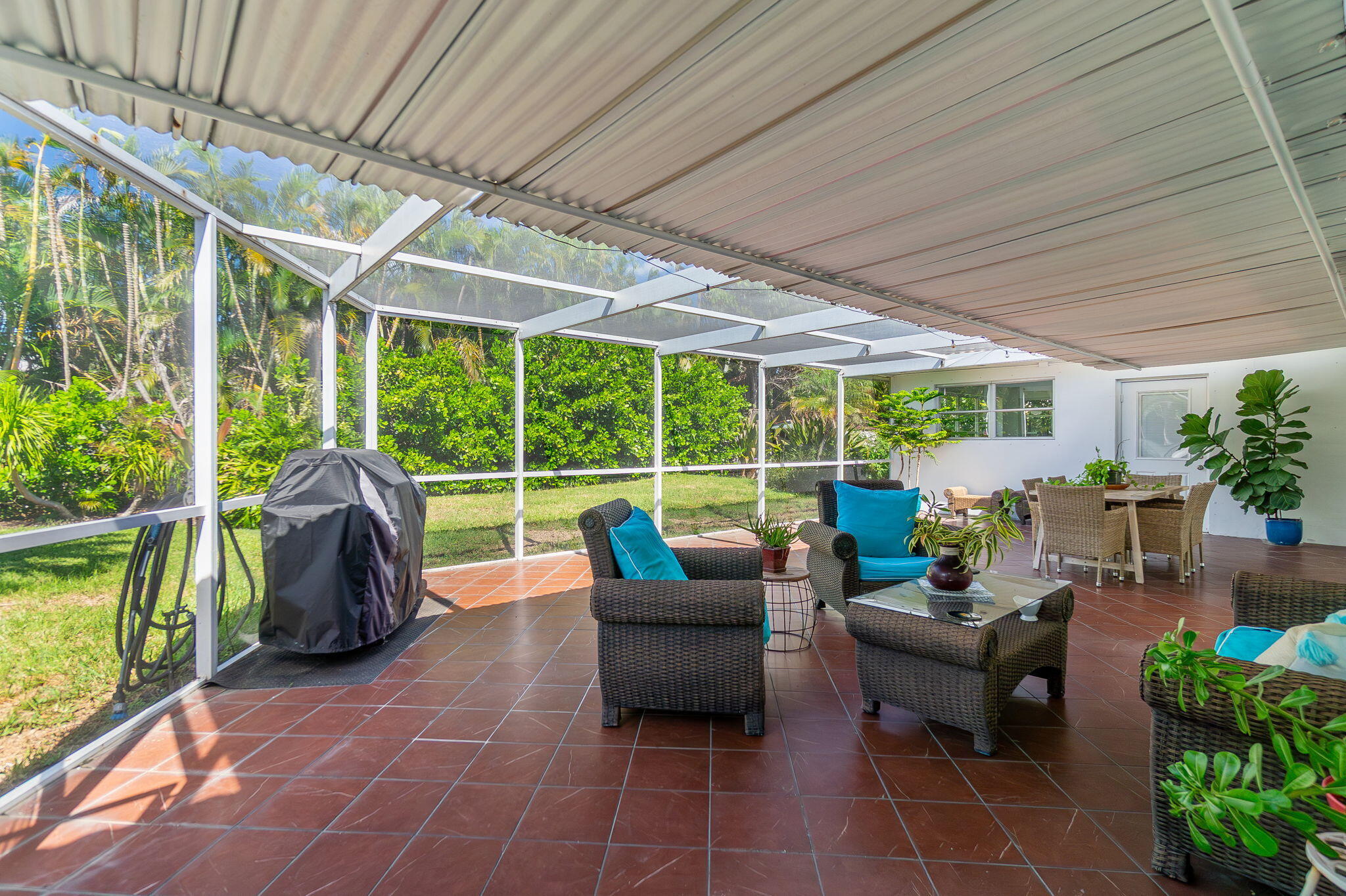 651 Ocean Inlet Drive Boynton Beach, FL 33435 - Photo 24 of 44 a building outdoor space with patio furniture