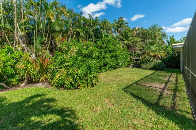 a view of yard with swimming pool