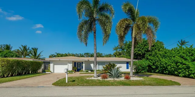 a front view of a house with porch