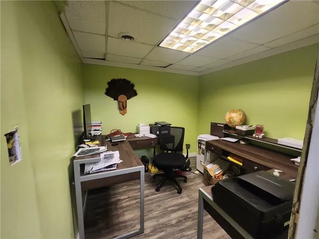 a bed room with a bed and a window