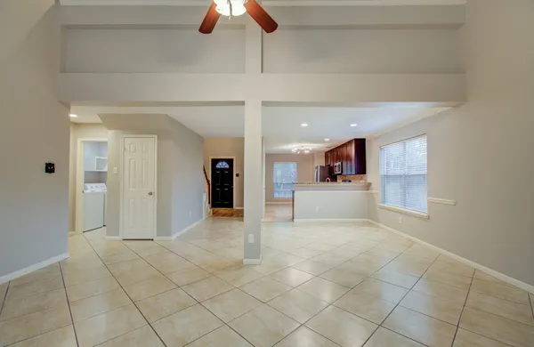 a view of a livingroom with a kitchen